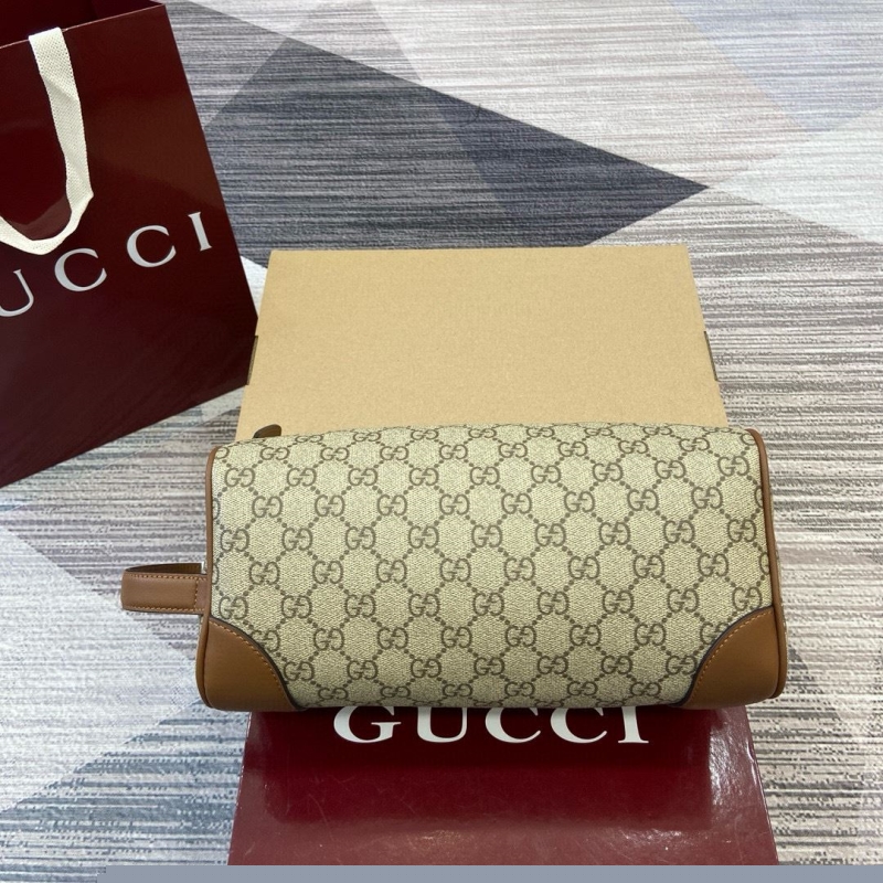 G*u*i clutch bags